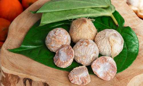 Areca buts with some betel leaves.