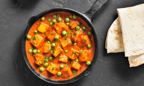 A paneer dish in a bowl.